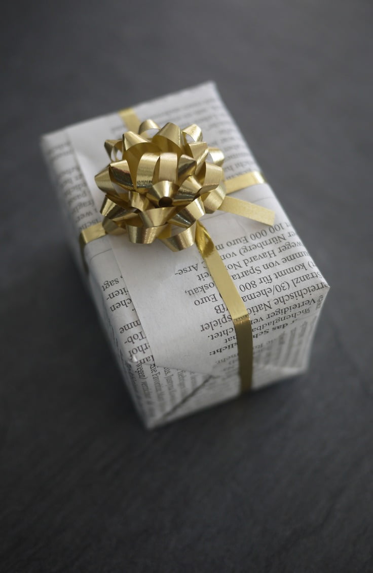 newspaper wrapped present