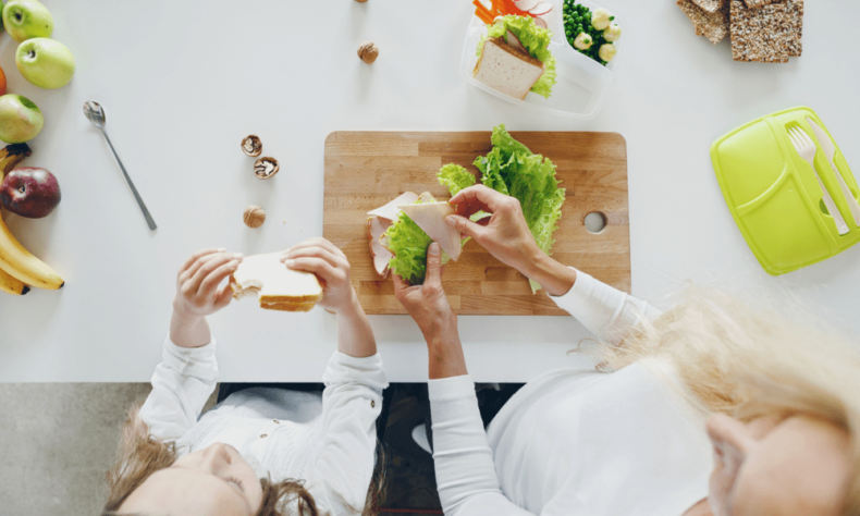 Kids helping make lunch