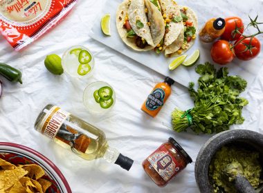 Collection of Cinco de Mayo ingredients, Mexican food, and a Spicy Jalapeño Margarita