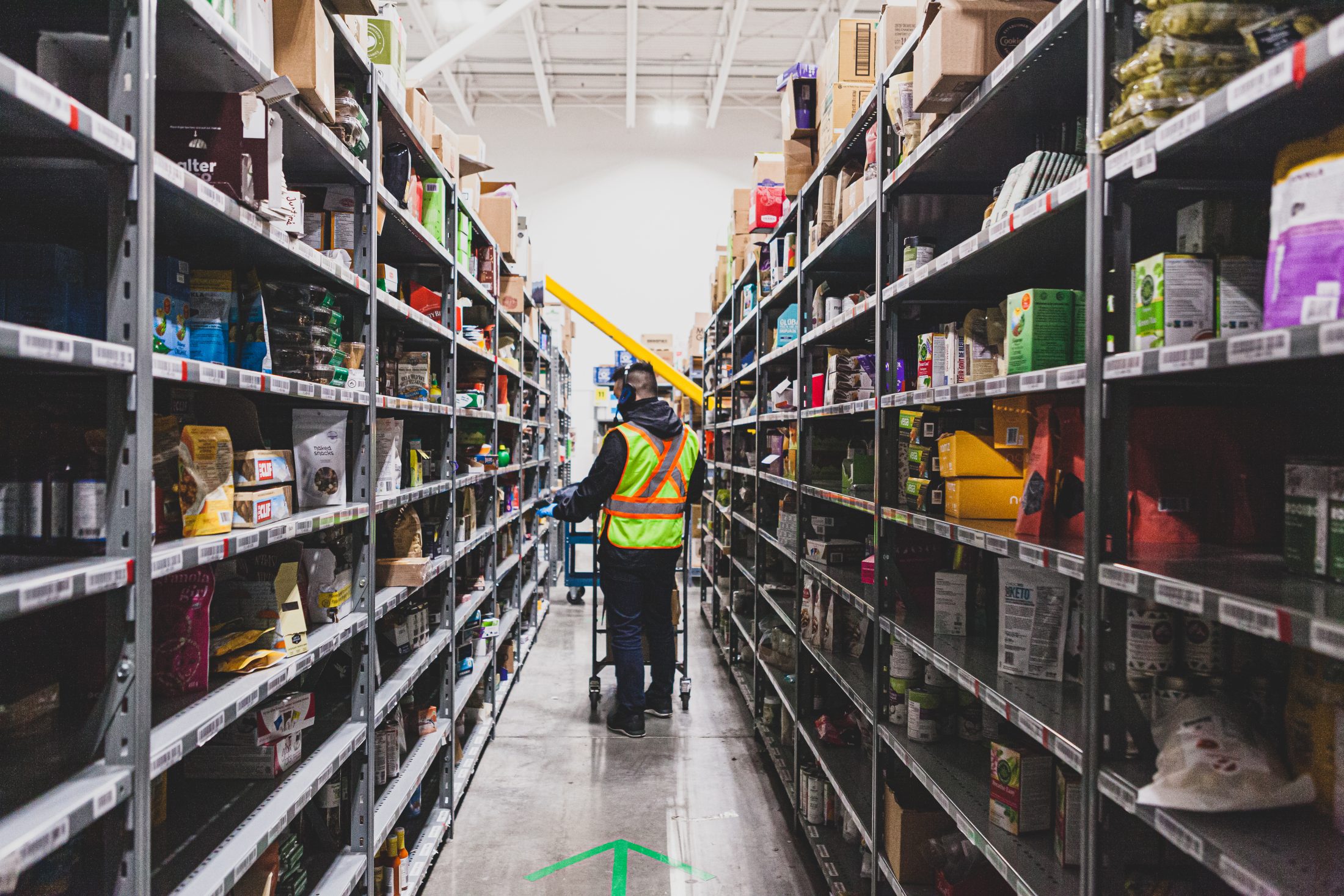 Spud Warehouse worker in the aisle